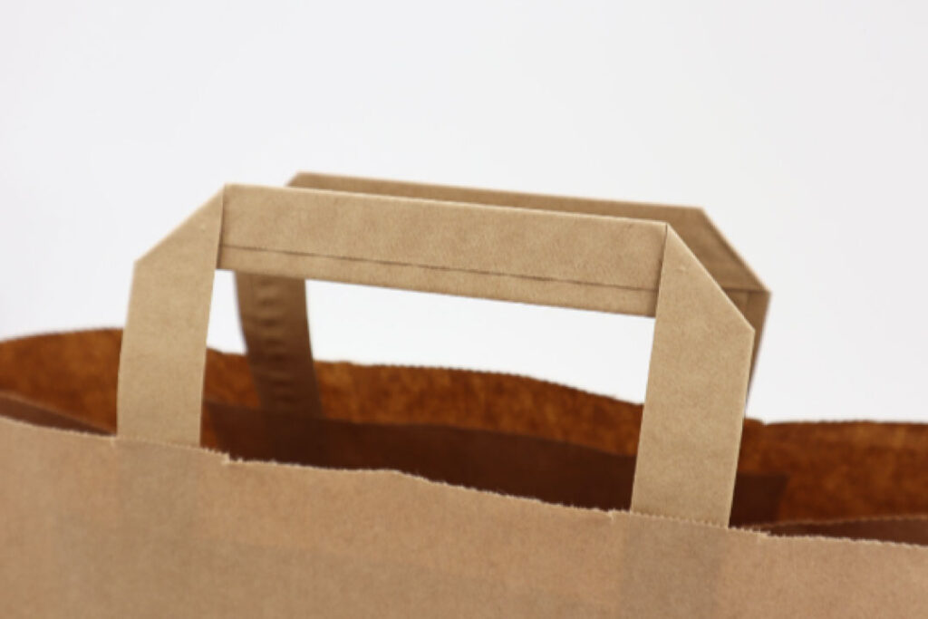 Paper bag with flat handles